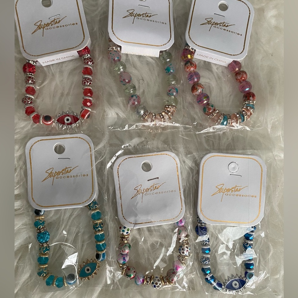 Superstar bracelets new in package multi color bracelets
